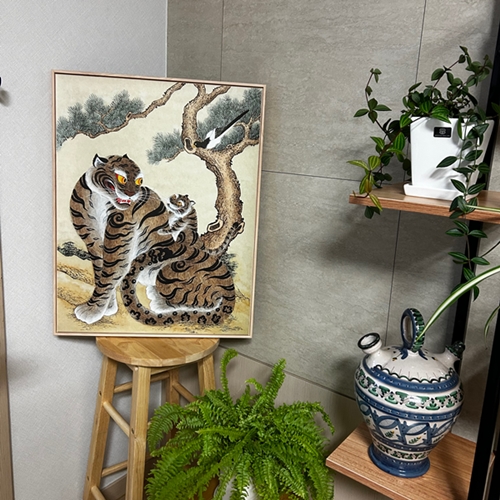 호작도예요. 호랑이가 악재를 막아주…